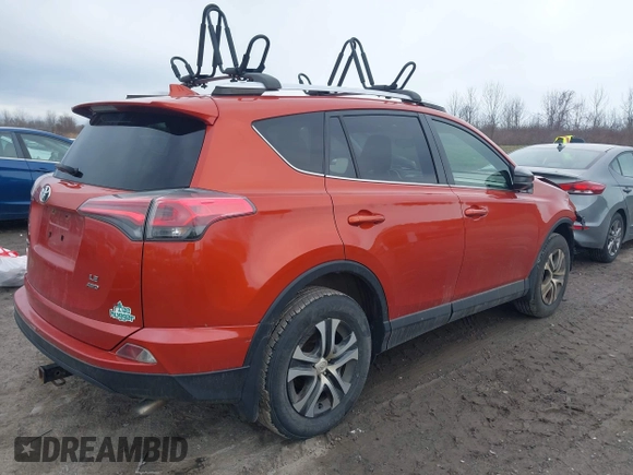 2016 Toyota RAV4 LE with VIN JTMBFREV8GJ085111, listed as a IAAI auction lot 42027408 with 150,978 mi miles. Bid and sale history available at carsss.com. Image 4.