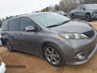 2011 Toyota Sienna SE with VIN 5TDXK3DC3BS143331, listed as a IAAI auction lot 41758043 with 215,490 mi miles. Bid and sale history available at carsss.com. Image 13.