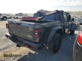 2023 Jeep Gladiator Rubicon с VIN 1C6JJTBGXPL574702, выставлен на аукционе Copart как лот 75914474 с пробегом 10 506 миль миль и Списание • Salvage title. История ставок и продаж доступна на DreamBid. Изображение 3.