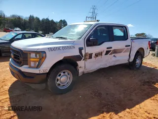 2023 Ford F-150 XL with VIN 1FTEW1CB8PKE69813, listed as a Copart auction lot 82370044 with 23,284 mi miles and Salvage Title. Bid and sale history available at carsss.com. Image 1.