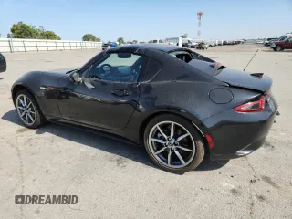 2022 Mazda MX-5 Miata Grand Touring z VIN JM1NDAM77N0503295, wystawiony jako Copart lot #58703795 z przebiegiem 14 237 mil mil oraz Szkoda całkowita • Salvage title. Historia ofert i sprzedaży dostępna na DreamBid. Obrazek 2.