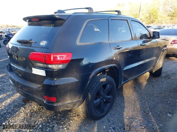 2015 Jeep Grand Cherokee Altitude with VIN 1C4RJFAG6FC796571, listed as a IAAI auction lot 41258471 with 104,049 mi miles. Bid and sale history available at carsss.com. Image 4.