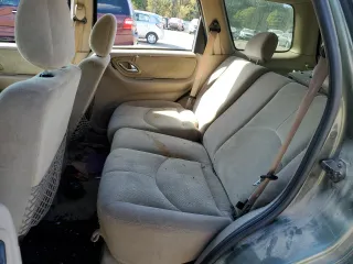 2002 Mazda Tribute LX with VIN 4F2YU09122KM62196, listed as a Copart auction lot 77327034 with 256,385 mi miles and Salvage Title. Bid and sale history available at carsss.com. Image 12.
