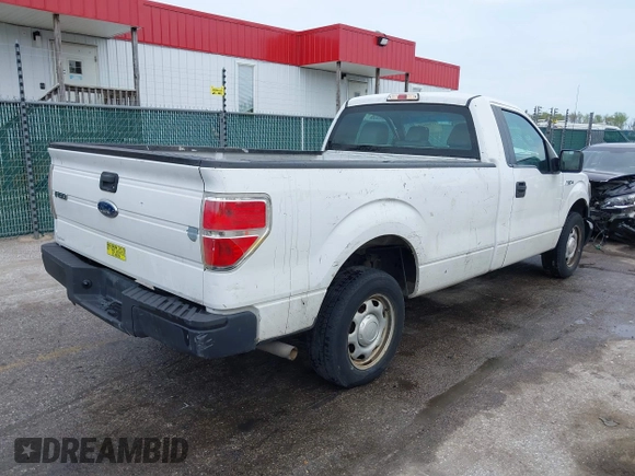 2014 Ford F-150 XL with VIN 1FTMF1CM0EKF70113, listed as a IAAI auction lot 41982424 with 150,007 mi miles. Bid and sale history available at carsss.com. Image 4.