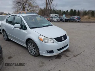 2012 Suzuki SX4 with VIN JS2YC5A52C6300339, listed as a IAAI auction lot 41829263 with 63,717 mi miles and . Bid and sale history available at DreamBid. Image 1.