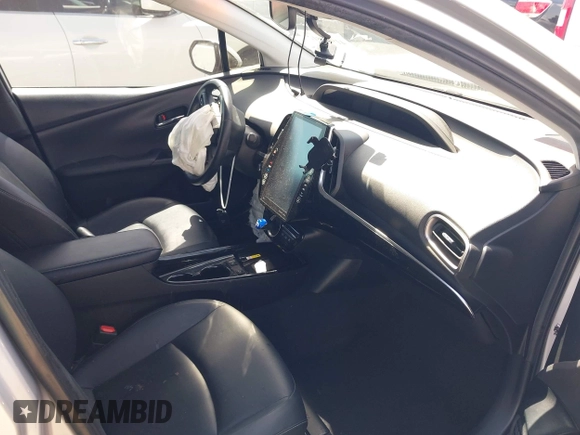 2021 Toyota Prius LE with VIN JTDKAMFP1M3180370, listed as a IAAI auction lot 41928512 with 83,249 mi miles and . Bid and sale history available at DreamBid. Image 5.