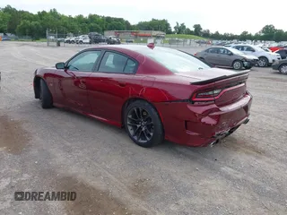 2020 Dodge Charger Scat Pack z VIN 2C3CDXGJ9LH112566, wystawiony jako IAAI lot #42330916 z przebiegiem 143 710 mil mil oraz . Historia ofert i sprzedaży dostępna na DreamBid. Obrazek 3.