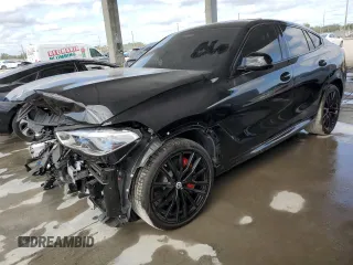 2023 BMW X6 M50i with VIN 5UXCY8C01P9S00552, listed as a Copart auction lot 84193154 with 16,590 mi miles and Salvage Title. Bid and sale history available at carsss.com. Image 1.