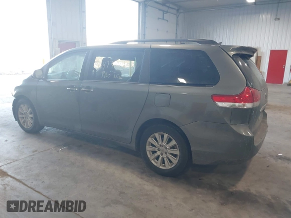 2011 Toyota Sienna XLE with VIN 5TDDK3DC6BS025101, listed as a IAAI auction lot 41473796 with 211,467 mi miles. Bid and sale history available at carsss.com. Image 3.