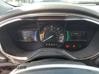2013 Ford Fusion SE Hybrid z VIN 3FA6P0LU0DR274279, wystawiony jako Copart lot #57462315 z przebiegiem 272 825 mil mil oraz Szkoda całkowita • Salvage title. Historia ofert i sprzedaży dostępna na DreamBid. Obrazek 9.