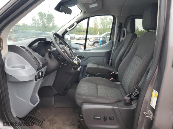2015 Ford Transit Wagon XL with VIN 1FBZX2YM9FKA53447, listed as a Copart auction lot 71352834 with 179,071 mi miles and Salvage Title. Bid and sale history available at carsss.com. Image 7.