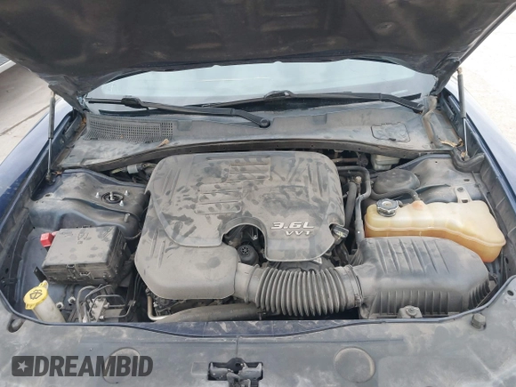 2014 Dodge Charger SXT with VIN 2C3CDXHG9EH315737, listed as a IAAI auction lot 41011662 with 98,104 mi miles and . Bid and sale history available at DreamBid. Image 10.