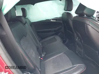 2020 Ford Edge SEL z VIN 2FMPK3J94LBB54068, wystawiony jako IAAI lot #41912225 z przebiegiem 83 528 mil mil oraz . Historia ofert i sprzedaży dostępna na DreamBid. Obrazek 8.