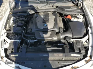 2010 BMW 6 Series 650i z VIN WBAEB5C50AC224807, wystawiony jako Copart lot #73411584 z przebiegiem 112 734 mil mil oraz Szkoda całkowita • Salvage title. Historia ofert i sprzedaży dostępna na DreamBid. Obrazek 11.