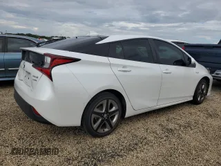 2021 Toyota Prius L Eco с VIN JTDKAMFU5M3142128, выставлен на аукционе Copart как лот 73832324 с пробегом 21 460 миль миль и Списание • Salvage title. История ставок и продаж доступна на DreamBid. Изображение 3.