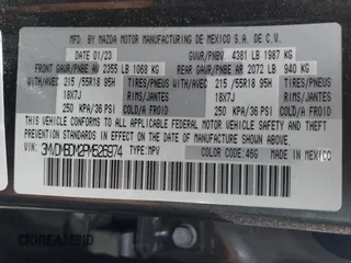 2023 Mazda CX-30 S Premium with VIN 3MVDMBDM2PM526974, listed as a IAAI auction lot 42155416 with 22,428 mi miles and . Bid and sale history available at carsss.com. Image 9.