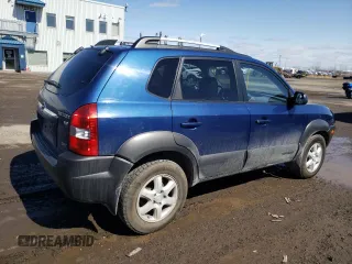 2005 Hyundai Tucson GL with VIN KM8JM72D55U167063, listed as a Copart auction lot 52002865 with 157,945 mi miles and Salvage Title. Bid and sale history available at carsss.com. Image 3.