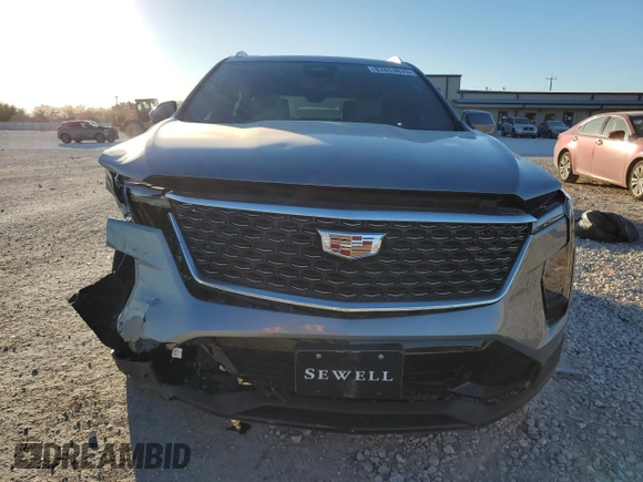 2024 Cadillac XT4 FWD Premium Luxury with VIN 1GYFZCR47RF213944, listed as a Copart auction lot 87674675 with 1,606 mi miles and Salvage title. Bid and sale history available at DreamBid. Image 5.