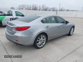 2015 Mazda 6 i Touring with VIN JM1GJ1V56F1209476, listed as a IAAI auction lot 41644215 with 112,255 mi miles. Bid and sale history available at carsss.com. Image 4.