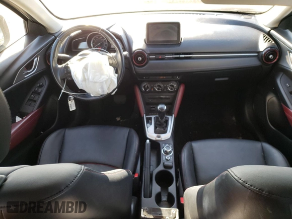 2016 Mazda CX-3 Touring z VIN JM1DKFC77G0136787, wystawiony jako Copart lot #50697845 z przebiegiem 96 277 mil mil oraz Szkoda całkowita • Salvage title. Historia ofert i sprzedaży dostępna na DreamBid. Obrazek 8.