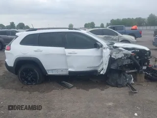 2021 Jeep Cherokee Trailhawk with VIN 1C4PJMBX4MD239112, listed as a IAAI auction lot 42271040 with 62,917 mi miles and . Bid and sale history available at DreamBid. Image 14.