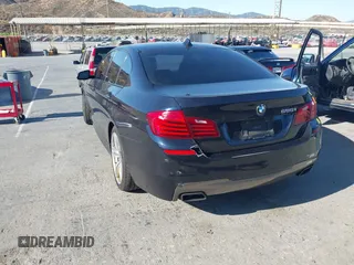 2015 BMW 5 Series 550i with VIN WBAKN9C56FD961027, listed as a IAAI auction lot 42653452 with 167,493 mi miles and . Bid and sale history available at DreamBid. Image 3.