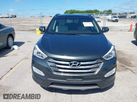 2014 Hyundai Santa Fe with VIN 5XYZUDLB0EG187984, listed as a IAAI auction lot 42607599 with 111,594 mi miles and . Bid and sale history available at DreamBid. Image 6.