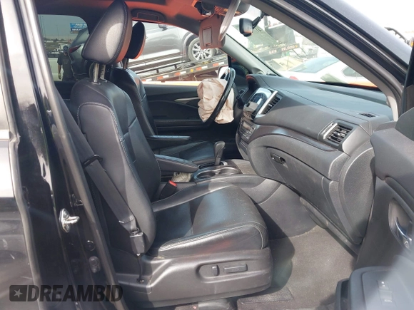 2017 Honda Pilot EX-L with VIN 5FNYF5H5XHB005735, listed as a IAAI auction lot 41791678 with 131,480 mi miles. Bid and sale history available at carsss.com. Image 5.