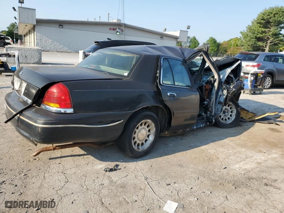 1999 Ford Crown Victoria LX with VIN 2FAFP74WXXX235990, listed as a Copart auction lot 69134854 with 174,636 mi miles and Non Repairable. Bid and sale history available at carsss.com. Image 3.