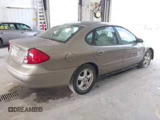 2002 Ford Taurus SES Standard with VIN 1FAFP55U32A171004, listed as a IAAI auction lot 41782261 with 105,967 mi miles. Bid and sale history available at carsss.com. Image 4.