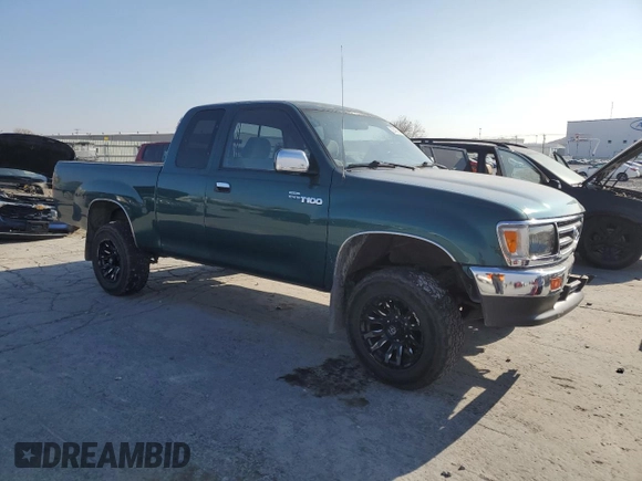 1997 Toyota T100 SR5 with VIN JT4UN24D8V0047084, listed as a Copart auction lot 82485654 with 181,596 mi miles and Salvage Title. Bid and sale history available at DreamBid. Image 4.
