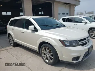 2014 Dodge Journey R/T z VIN 3C4PDCEG2ET136778, wystawiony jako IAAI lot #42137095 z przebiegiem 228 621 mil mil oraz . Historia ofert i sprzedaży dostępna na DreamBid. Obrazek 1.