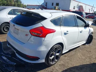 2017 Ford Focus ST with VIN 1FADP3L94HL214904, listed as a IAAI auction lot 40544868 with 77,098 mi miles and . Bid and sale history available at carsss.com. Image 4.