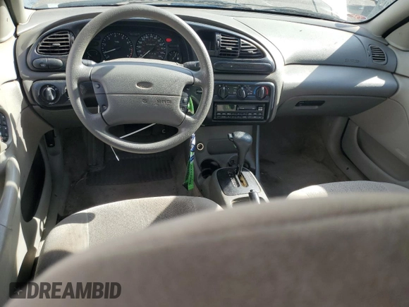 1998 Ford Contour LX with VIN 1FAFP66L2WK290948, listed as a Copart auction lot 56204295 with 76,307 mi miles and Salvage title. Bid and sale history available at DreamBid. Image 8.