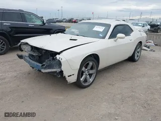 2014 Dodge Challenger SXT with VIN 2C3CDYAG0EH247473, listed as a IAAI auction lot 41358476 with 86,818 mi miles. Bid and sale history available at carsss.com. Image 2.