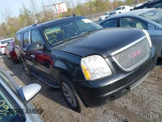 2011 GMC Yukon XL Denali with VIN 1GKS1MEF7BR271098, listed as a IAAI auction lot 42064073 with 218,601 mi miles. Bid and sale history available at carsss.com. Image 1.
