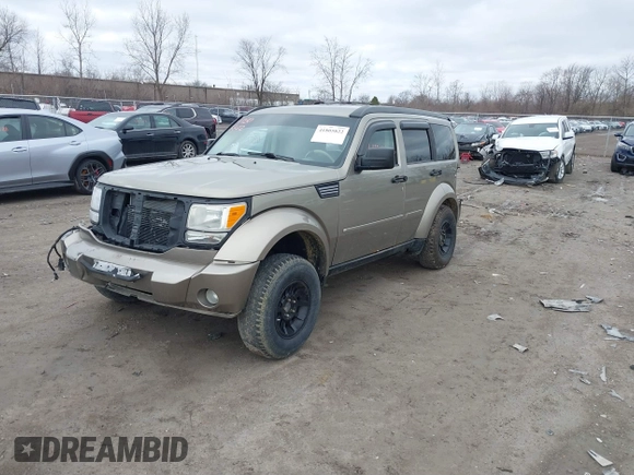 2007 Dodge Nitro SLT z VIN 1D8GU58K97W700047, wystawiony jako IAAI lot #41805822 z przebiegiem 186 604 mil mil oraz . Historia ofert i sprzedaży dostępna na DreamBid. Obrazek 2.