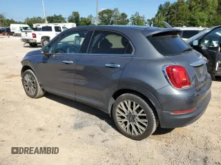 2018 FIAT 500X Lounge with VIN ZFBCFXDB5JP664130, listed as a Copart auction lot 73784574 with 67,160 mi miles and Salvage title. Bid and sale history available at DreamBid. Image 2.