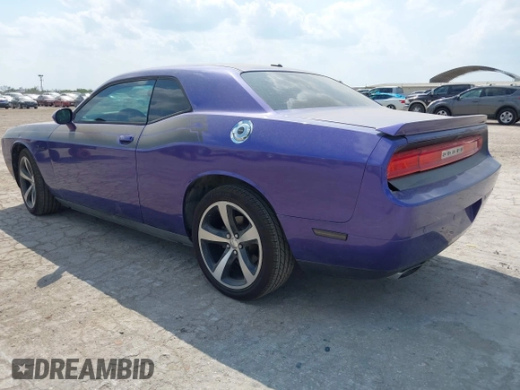 2014 Dodge Challenger R/T z VIN 2C3CDYBT0EH143576, wystawiony jako IAAI lot #42333984 z przebiegiem 189 874 mil mil oraz . Historia ofert i sprzedaży dostępna na DreamBid. Obrazek 3.