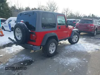 2005 Jeep Wrangler Rubicon with VIN 1J4FA69S25P316085, listed as a IAAI auction lot 41503034 with 57,252 mi miles. Bid and sale history available at carsss.com. Image 4.