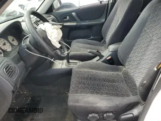 2002 Mazda Protege z VIN JM1BJ245721470434, wystawiony jako Copart lot #57293765 z przebiegiem 144 622 mil mil oraz Szkoda całkowita • Salvage title. Historia ofert i sprzedaży dostępna na DreamBid. Obrazek 7.