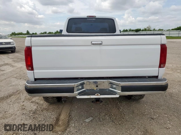 1994 Ford F-250 with VIN 1FTHX25H5RKB57176, listed as a Copart auction lot 63432875 with 188,923 mi miles and Salvage title. Bid and sale history available at DreamBid. Image 6.