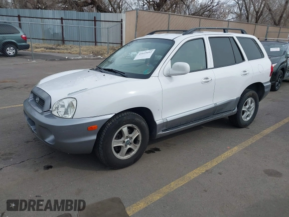2004 Hyundai Santa Fe GLS with VIN KM8SC13DX4U609921, listed as a IAAI auction lot 41619492 with 113,592 mi miles. Bid and sale history available at carsss.com. Image 17.