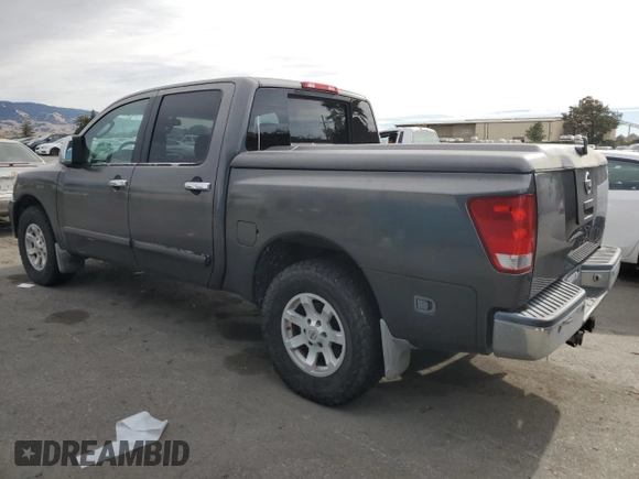 2005 Nissan Titan SE with VIN 1N6AA07B65N566082, listed as a Copart auction lot 80879174 with 215,297 mi miles and Clean Title. Bid and sale history available at carsss.com. Image 2.