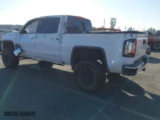 2016 GMC Sierra 1500 SLT with VIN 3GTU2NEC2GG244329, listed as a IAAI auction lot 40810002 with 121,716 mi miles. Bid and sale history available at carsss.com. Image 3.