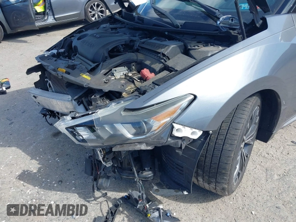 2018 Nissan Maxima SV with VIN 1N4AA6AP2JC385535, listed as a IAAI auction lot 42299100 with 81,431 mi miles and . Bid and sale history available at DreamBid. Image 22.