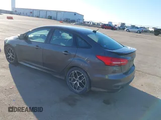 2016 Ford Focus SE with VIN 1FADP3F27GL374188, listed as a IAAI auction lot 41738121 with 125,229 mi miles. Bid and sale history available at carsss.com. Image 3.