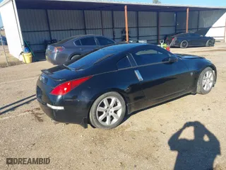 2003 Nissan 350Z Touring with VIN JN1AZ34E73T014727, listed as a IAAI auction lot 41667489 with 170,323 mi miles. Bid and sale history available at carsss.com. Image 4.