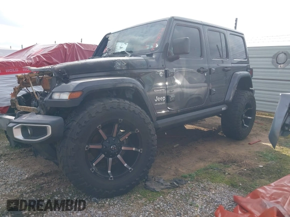 2019 Jeep Wrangler Unlimited Sahara with VIN 1C4HJXEG7KW661801, listed as a IAAI auction lot 40848731 with Not provided miles and . Bid and sale history available at DreamBid. Image 2.