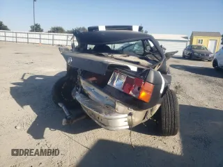 1984 BMW 3 Series 325e z VIN WBAAB5402E1002031, wystawiony jako Copart lot #72086004 z przebiegiem 866 397 mil mil oraz Szkoda całkowita • Salvage title. Historia ofert i sprzedaży dostępna na DreamBid. Obrazek 6.